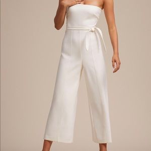 Likely white strapless jumper
